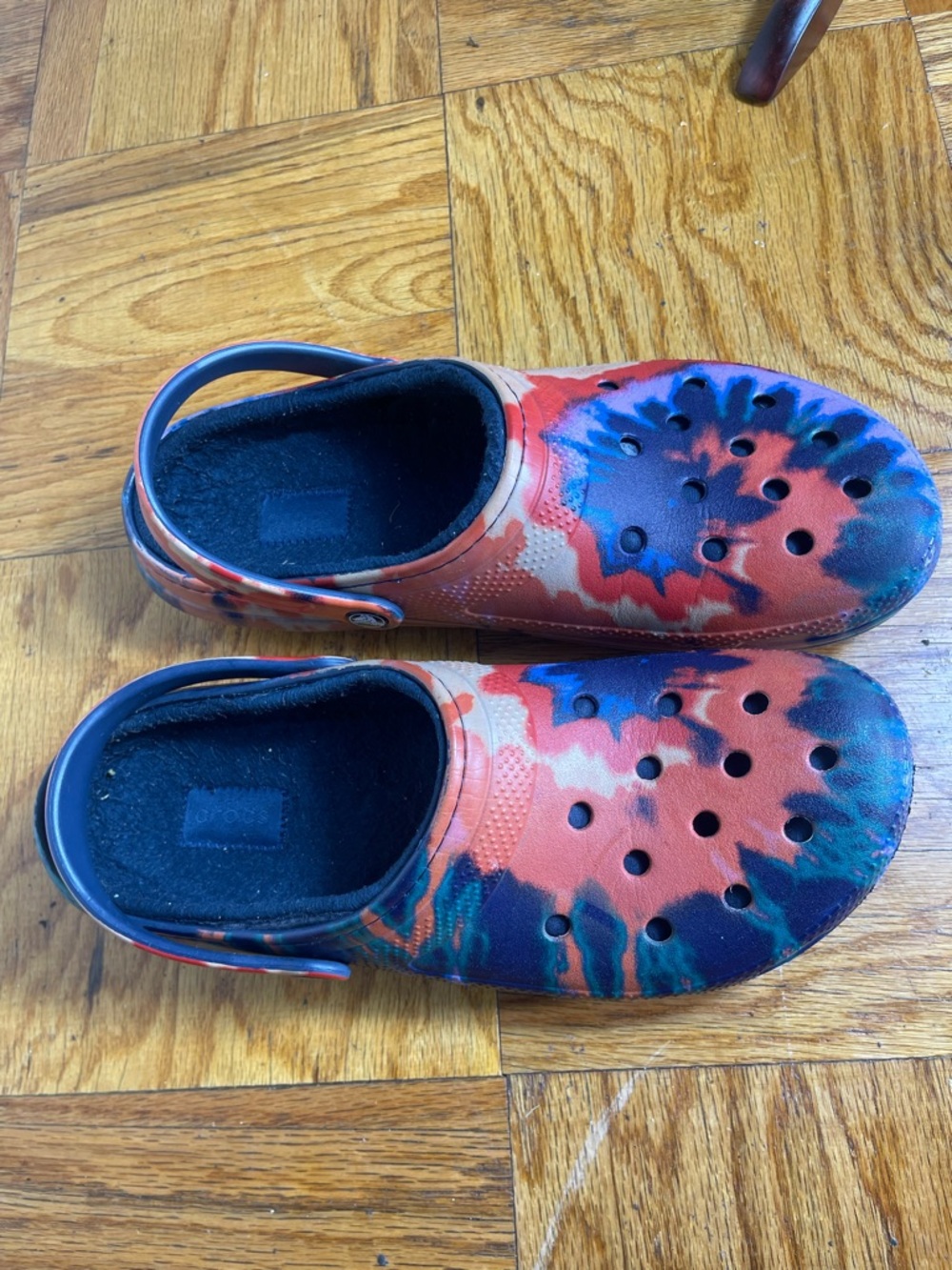 Crocs—red, white and blue.  Fleece lining. Men’s size 12